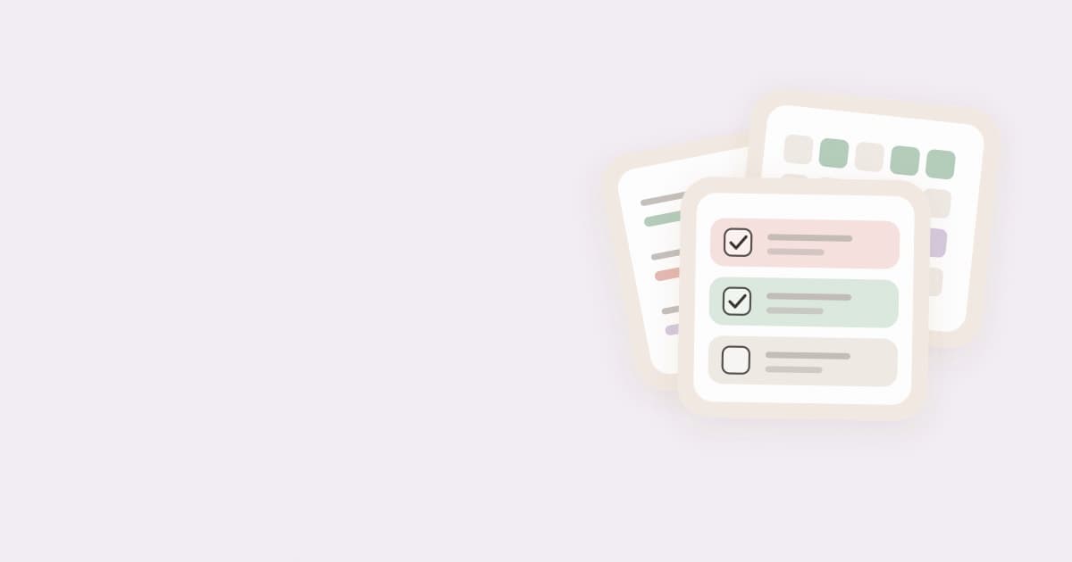 Three planner cards fanned out, with a checklist in front of a habit grid and a budget card.